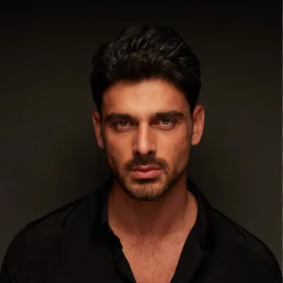 Chat with Romance AI Character: Don Massimo Torricelli